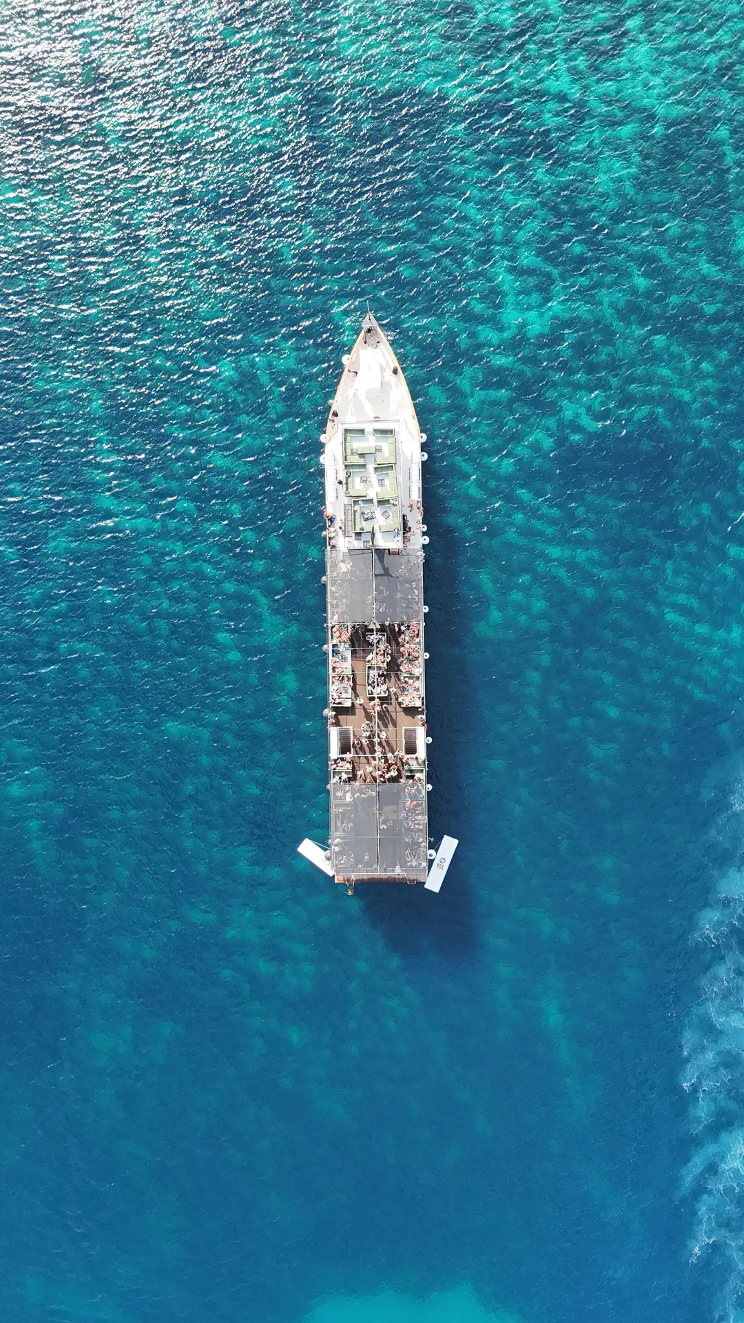 aerial view of a boat at the sea