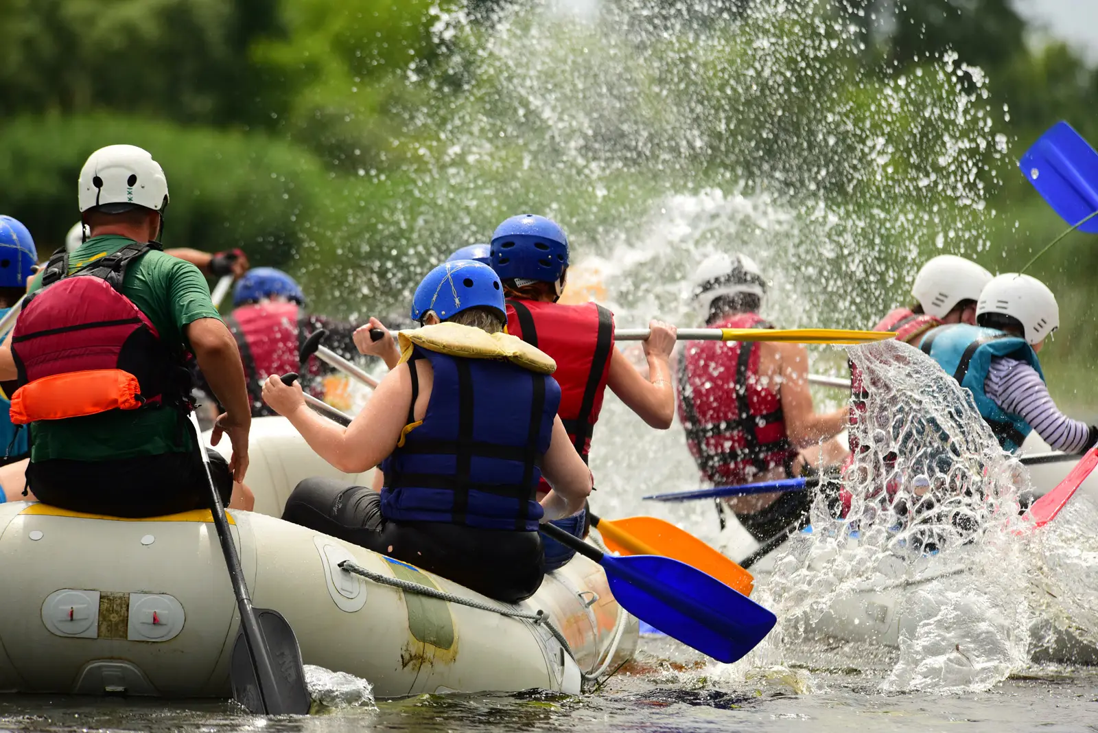 group of people rafting on a river